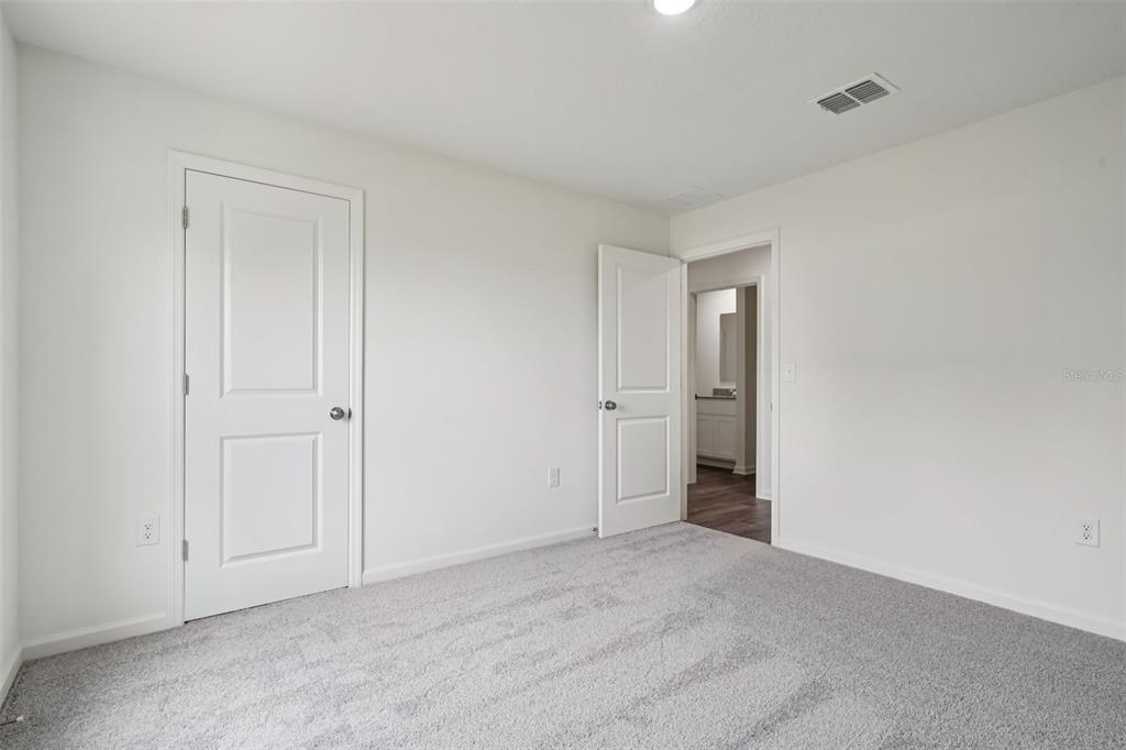 2155 Northwest 23rd Loop Ocala, FL 34475 - Photo 17 of 24 a view of an empty room and closet area