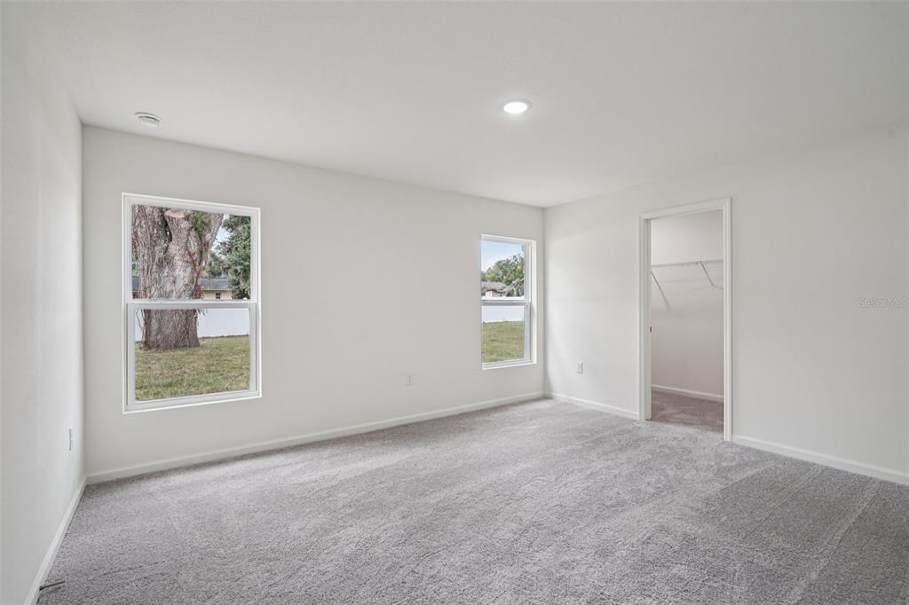 2155 Northwest 23rd Loop Ocala, FL 34475 - Photo 24 of 24 a view of an empty room with a window