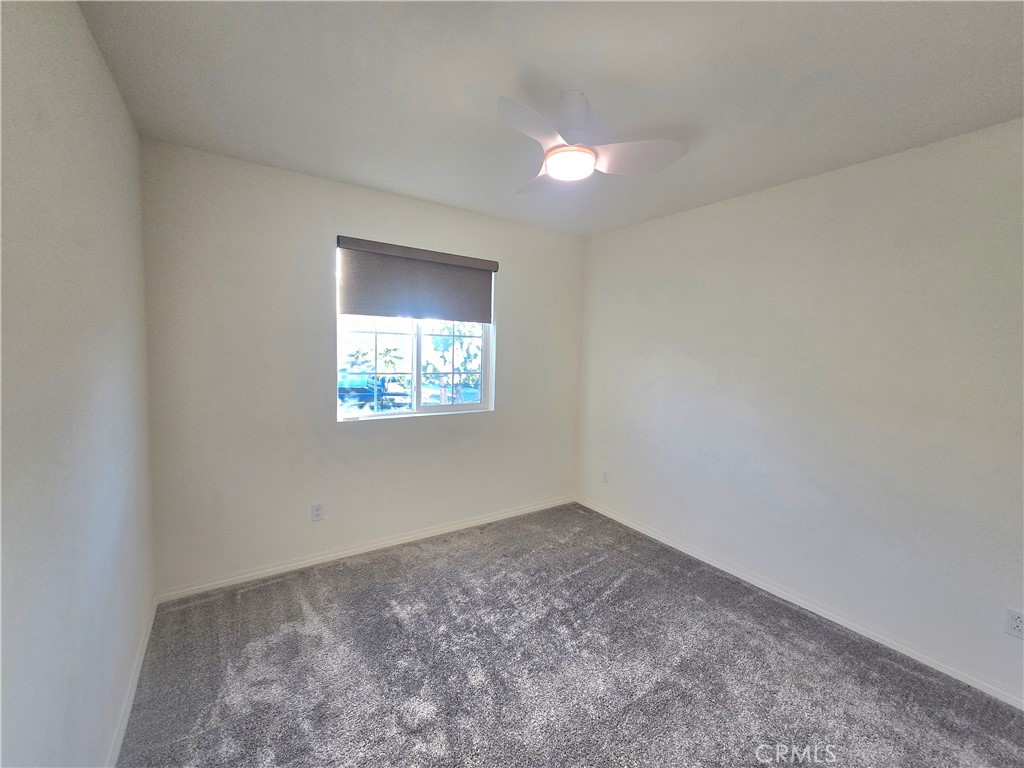 6451 Canyonlands Drive Jurupa Valley, CA 92509 - Photo 13 of 23 an empty room with a window