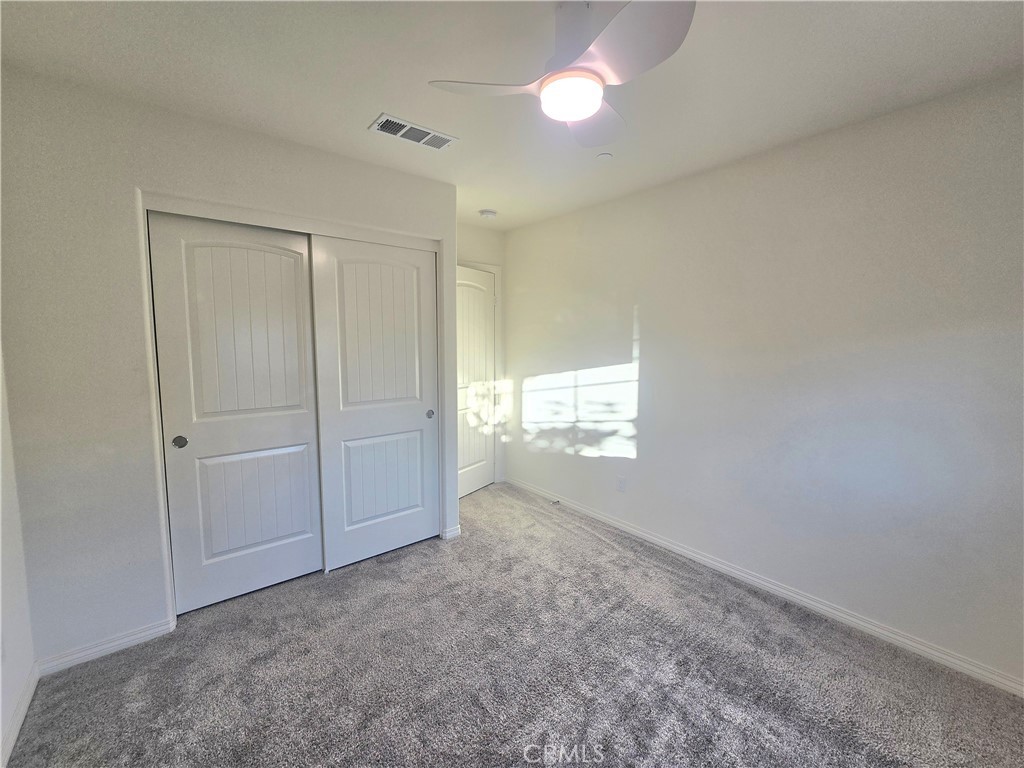 6451 Canyonlands Drive Jurupa Valley, CA 92509 - Photo 14 of 23 a view of an empty room and window
