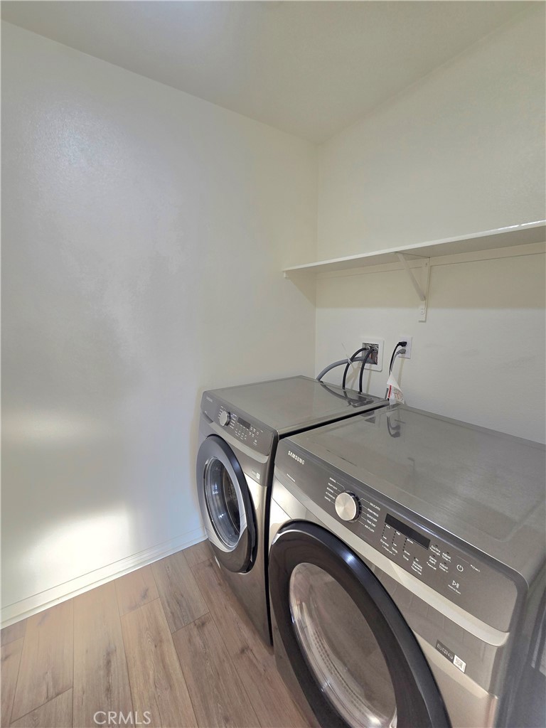 6451 Canyonlands Drive Jurupa Valley, CA 92509 - Photo 15 of 23 a utility room with dryer and washer