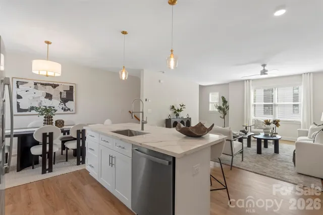 a dining room with furniture and window