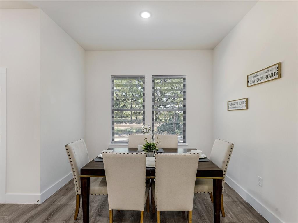6123 Inca Drive Mabank, TX 75156 - Photo 12 of 32 a view of a dining room with furniture and a window