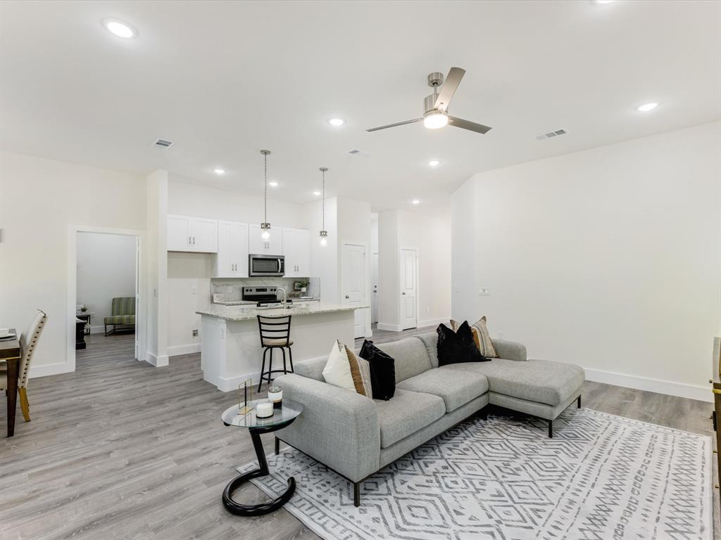 6123 Inca Drive Mabank, TX 75156 - Photo 16 of 32 a living room with furniture and kitchen view