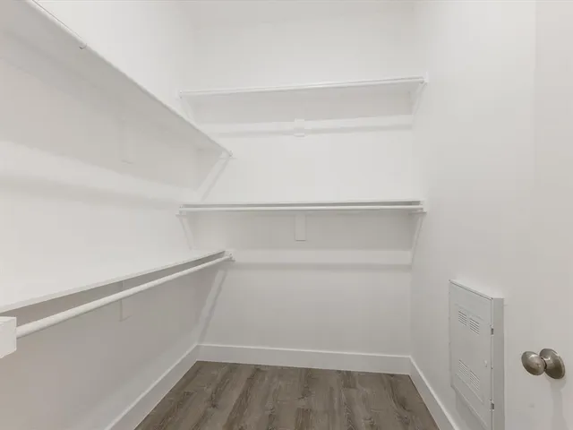 a view of an empty walk in closet