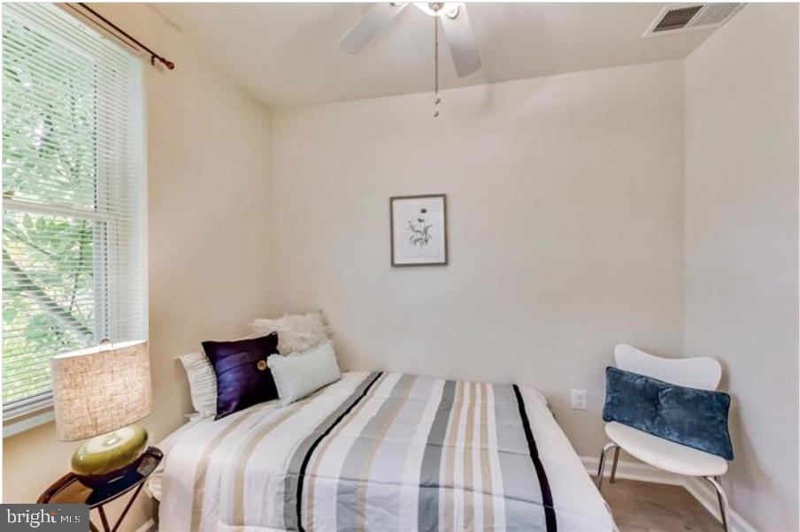1720 H Street Northeast, Unit A Washington, DC 20002 - Photo 11 of 31 Cozy bedroom with natural light.