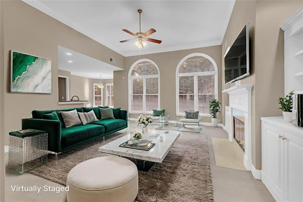 2403 Bonshaw Lane Southwest Marietta, GA 30064 - Photo 15 of 47 a living room with furniture fireplace and flat screen tv