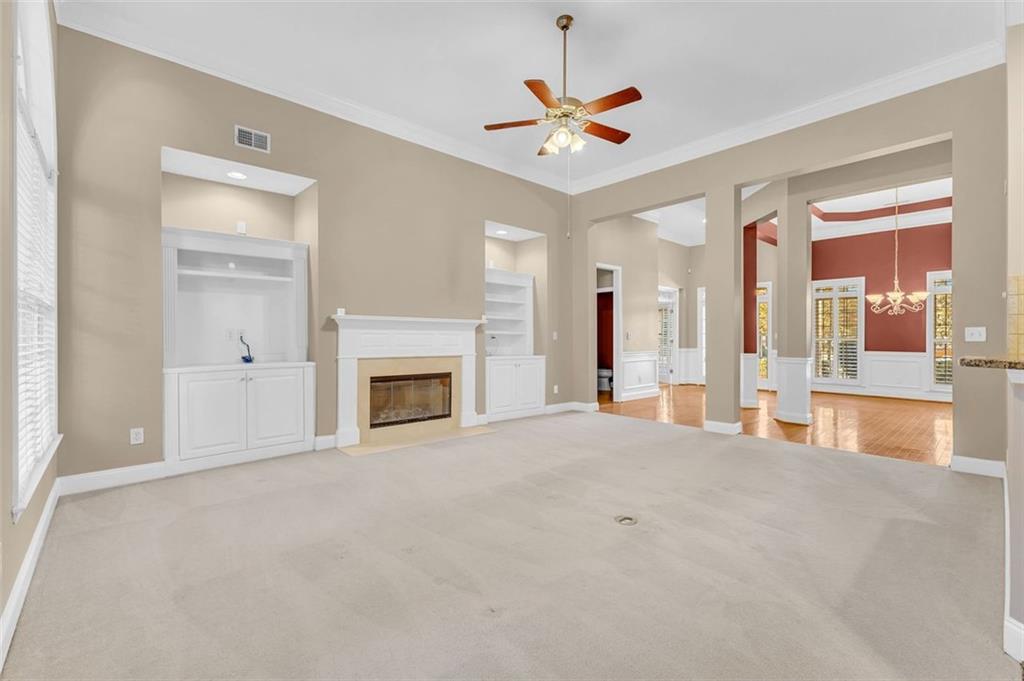 2403 Bonshaw Lane Southwest Marietta, GA 30064 - Photo 16 of 47 a view of an empty room with a fireplace