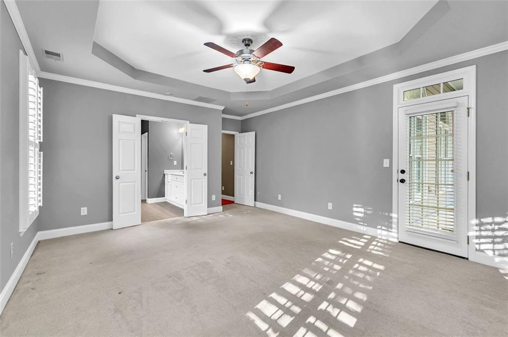 2403 Bonshaw Lane Southwest Marietta, GA 30064 - Photo 26 of 47 a view of a livingroom with a ceiling fan and window