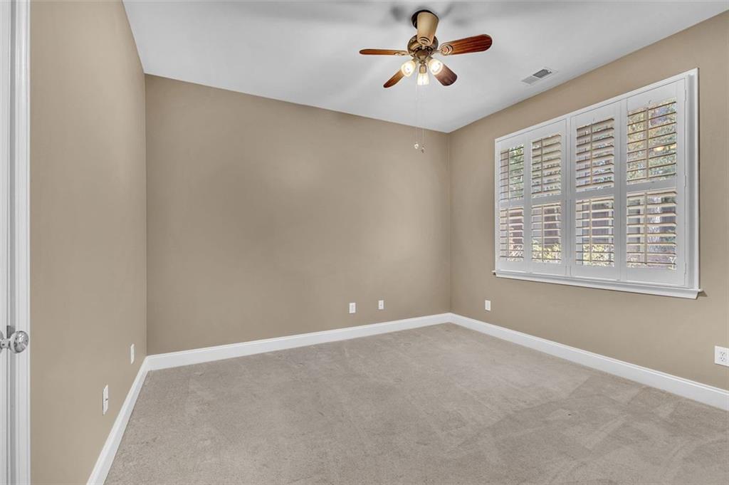 2403 Bonshaw Lane Southwest Marietta, GA 30064 - Photo 31 of 47 a view of an empty room with a window