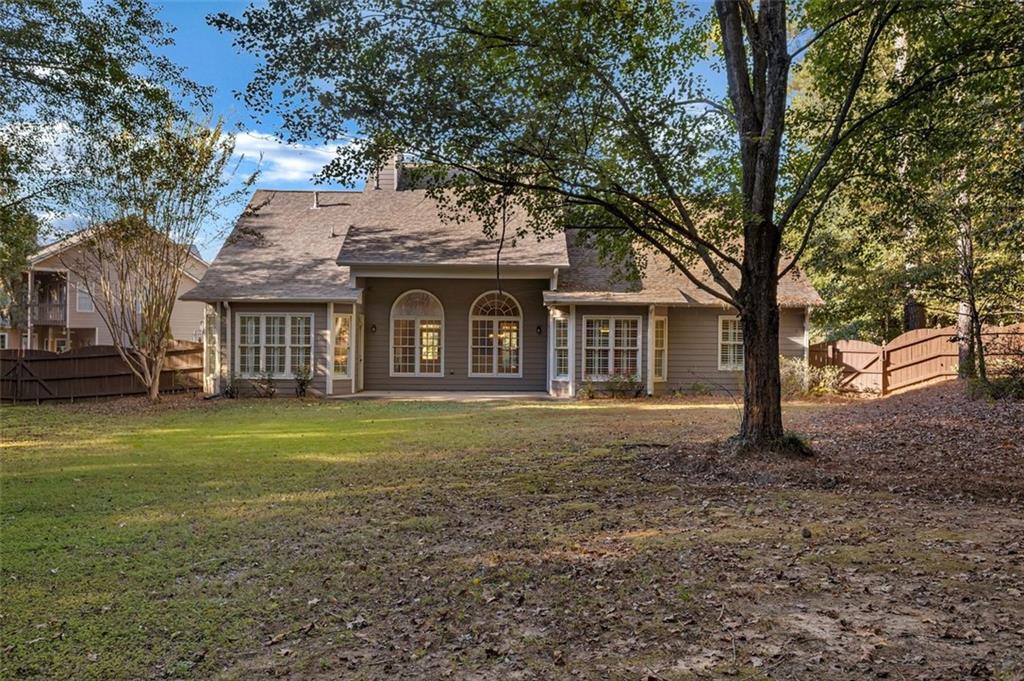 2403 Bonshaw Lane Southwest Marietta, GA 30064 - Photo 39 of 47 a front view of a house with a garden