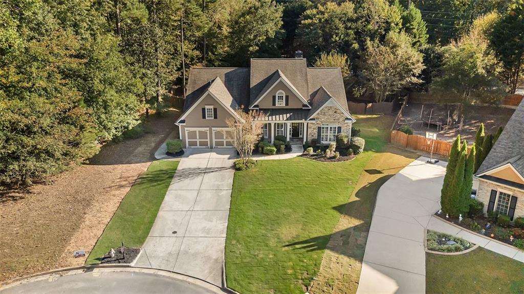 2403 Bonshaw Lane Southwest Marietta, GA 30064 - Photo 40 of 47 a view of a house with a yard