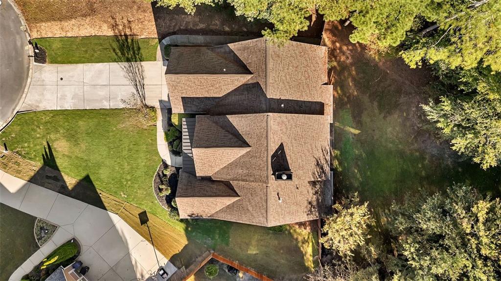 2403 Bonshaw Lane Southwest Marietta, GA 30064 - Photo 42 of 47 an aerial view of houses with yard