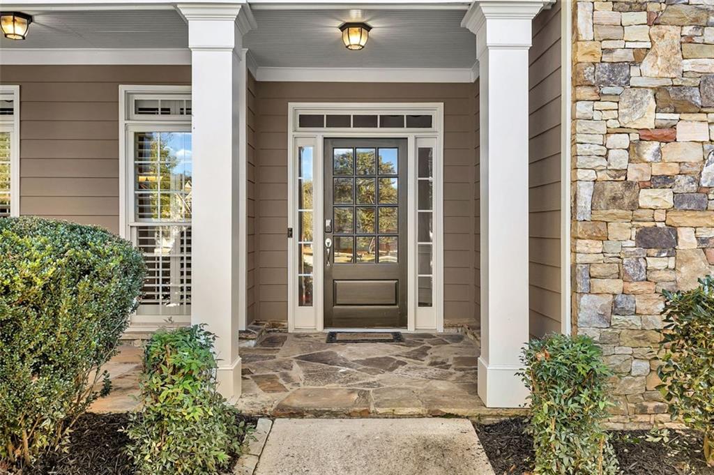 2403 Bonshaw Lane Southwest Marietta, GA 30064 - Photo 5 of 47 a front view of a house with a yard