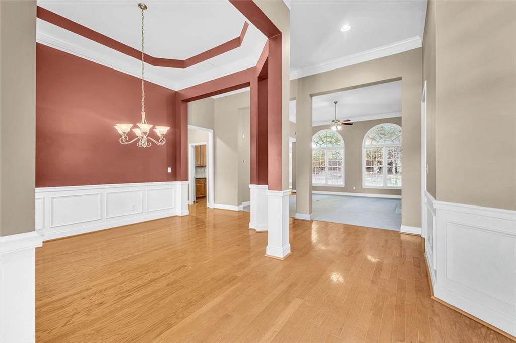 2403 Bonshaw Lane Southwest Marietta, GA 30064 - Photo 7 of 47 a view of an empty room with window and wooden floor
