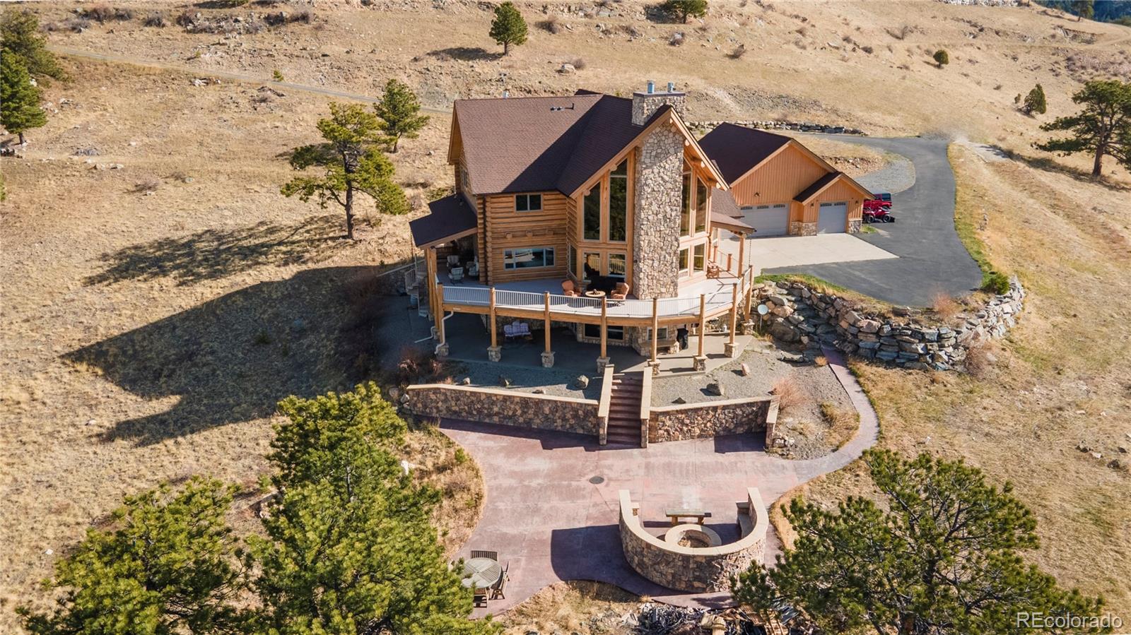 401 Raptor Point Golden, CO 80403 - Photo 3 of 48 a view of a house with a yard