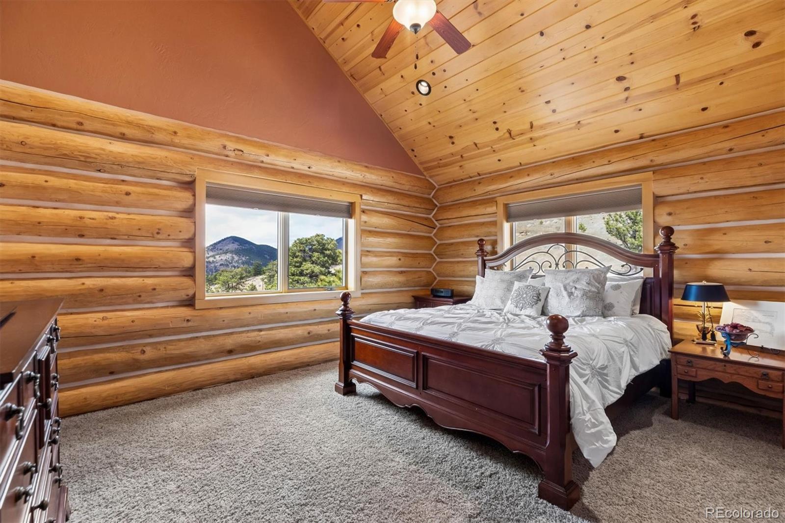 401 Raptor Point Golden, CO 80403 - Photo 35 of 48 a bedroom with a bed and a window