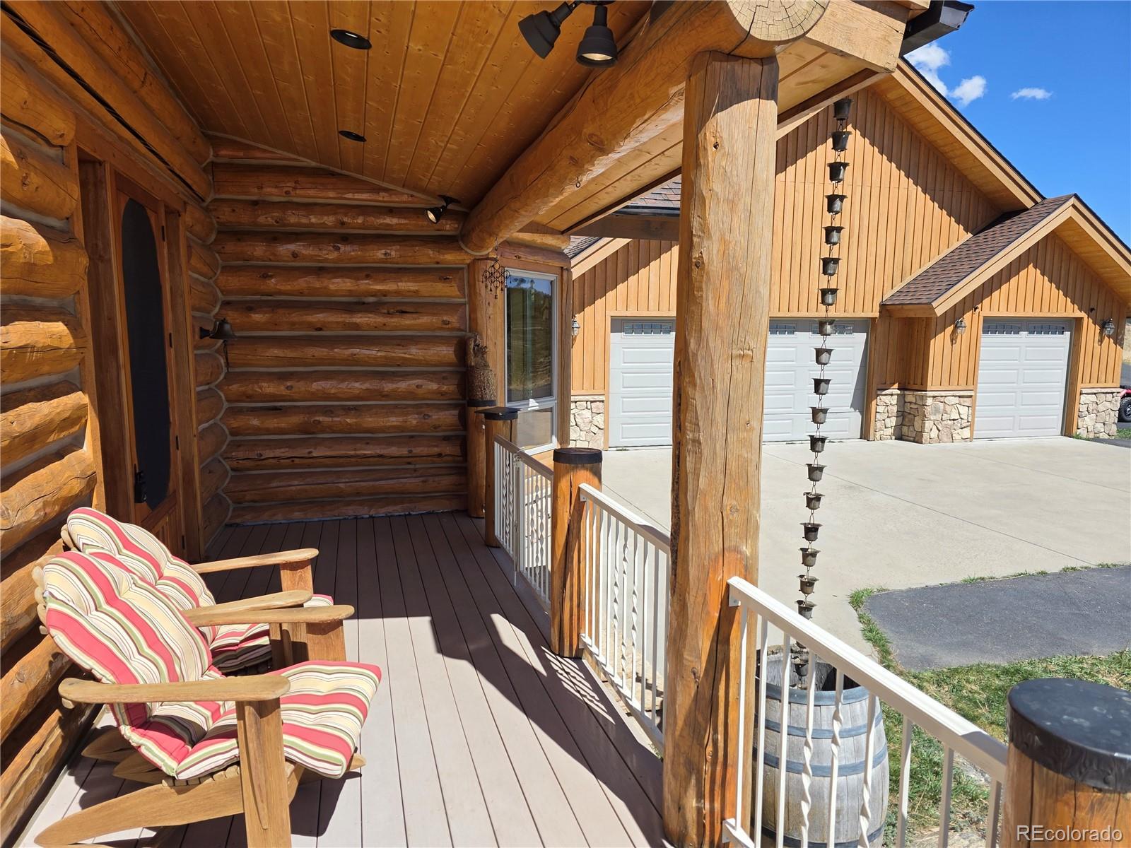 401 Raptor Point Golden, CO 80403 - Photo 6 of 48 a view of balcony with wooden floor and outdoor seating