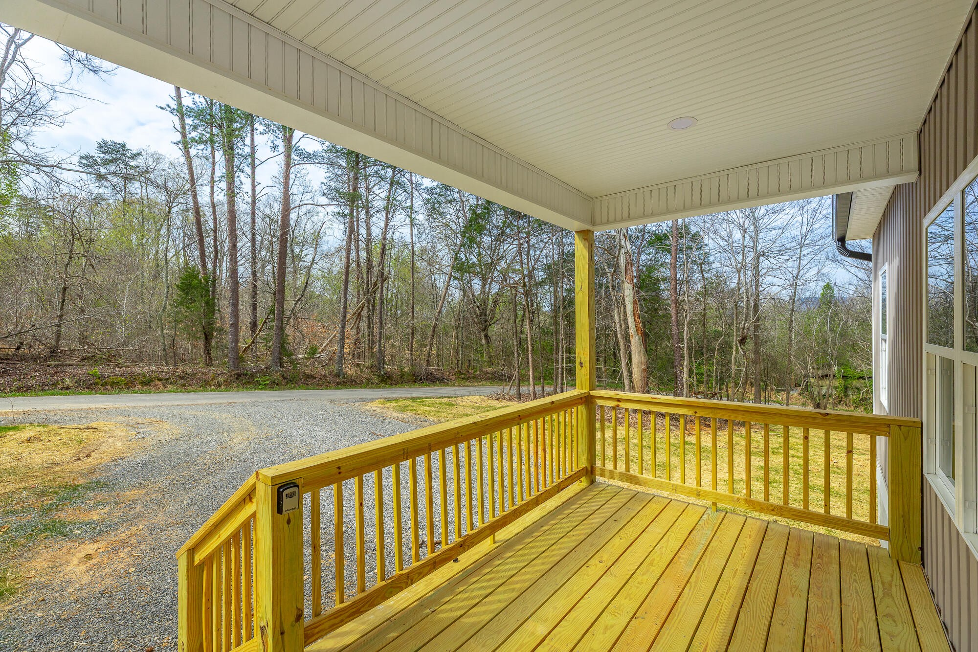 77 Pineway Circle Wildwood, GA 30757 - Photo 11 of 52 a view of a balcony with wooden floor