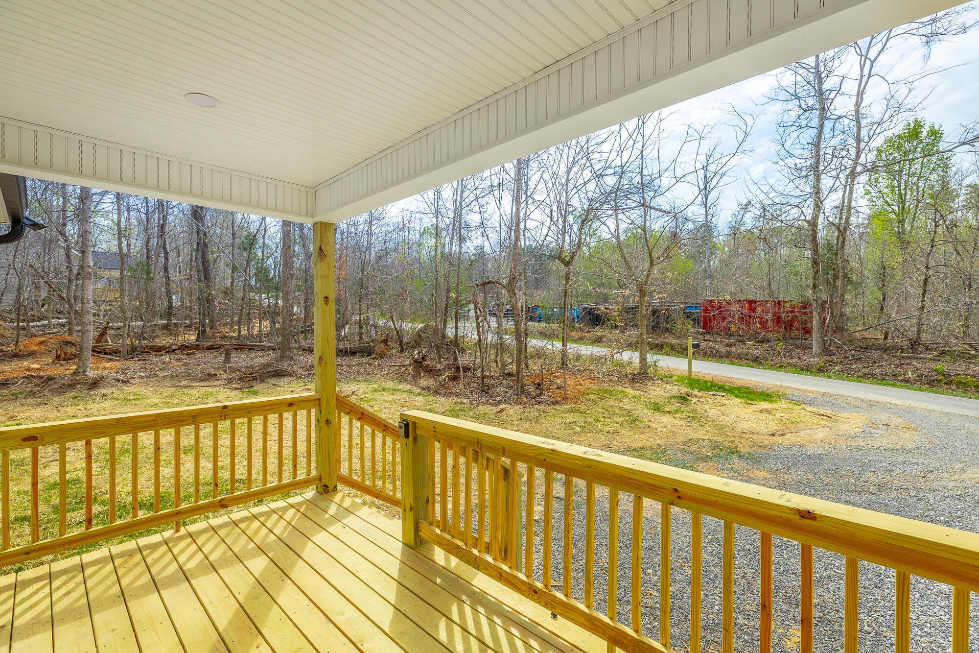 77 Pineway Circle Wildwood, GA 30757 - Photo 13 of 52 a view of a porch and wooden floor