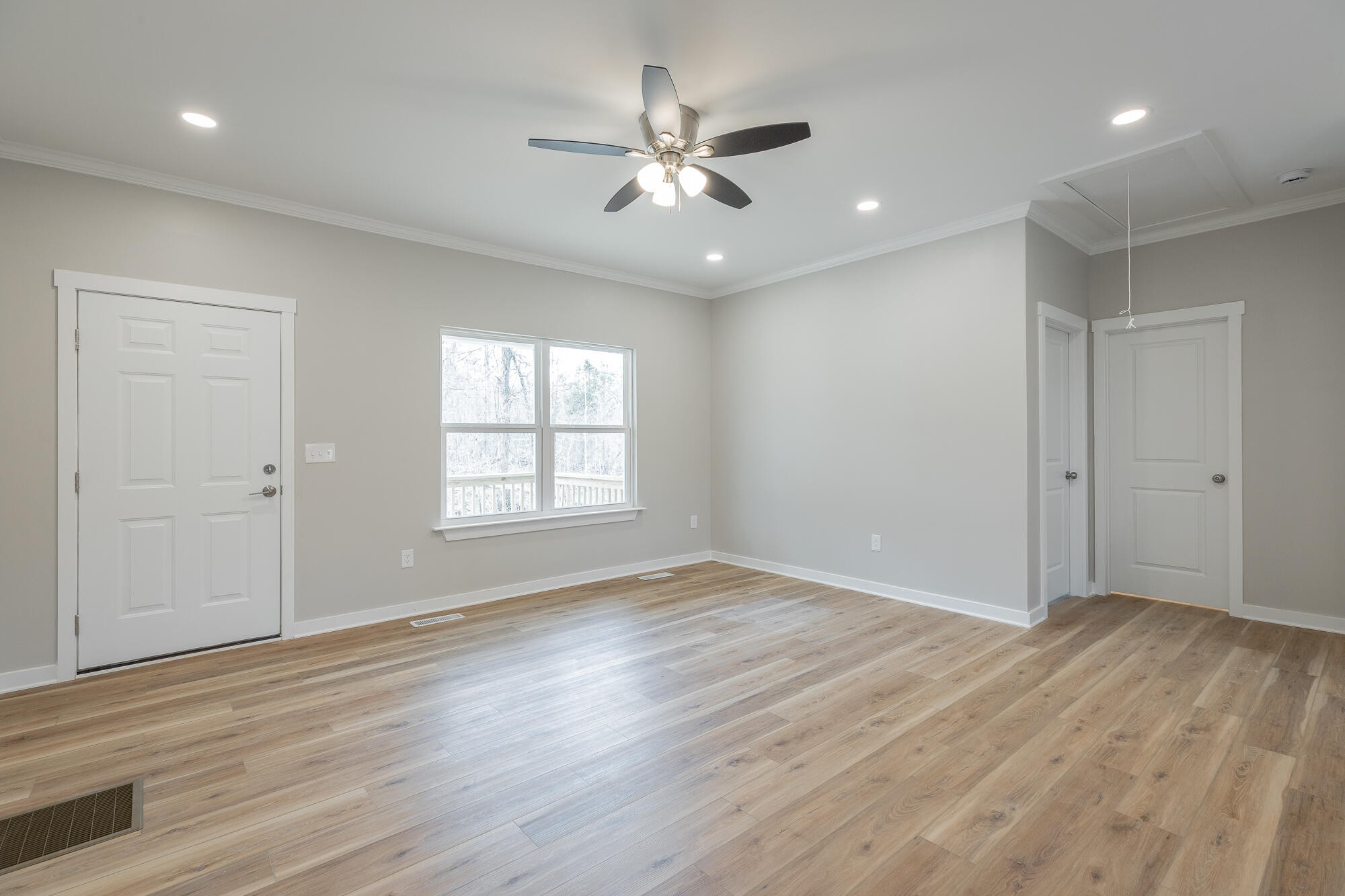 77 Pineway Circle Wildwood, GA 30757 - Photo 14 of 52 a view of an empty room with wooden floor and a window
