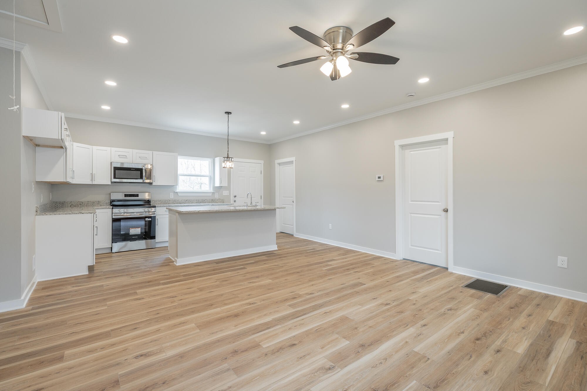 77 Pineway Circle Wildwood, GA 30757 - Photo 16 of 52 a view of kitchen with wooden floor and window