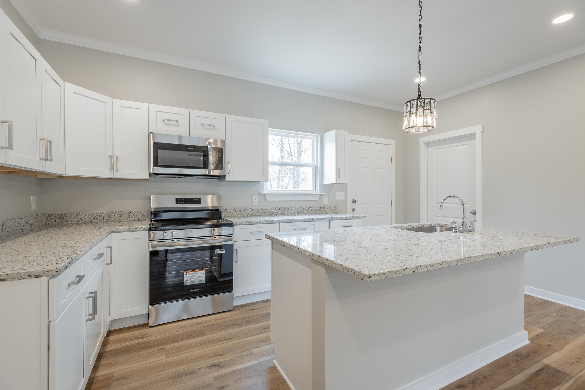 77 Pineway Circle Wildwood, GA 30757 - Photo 19 of 52 a kitchen with stainless steel appliances granite countertop a sink stove and microwave