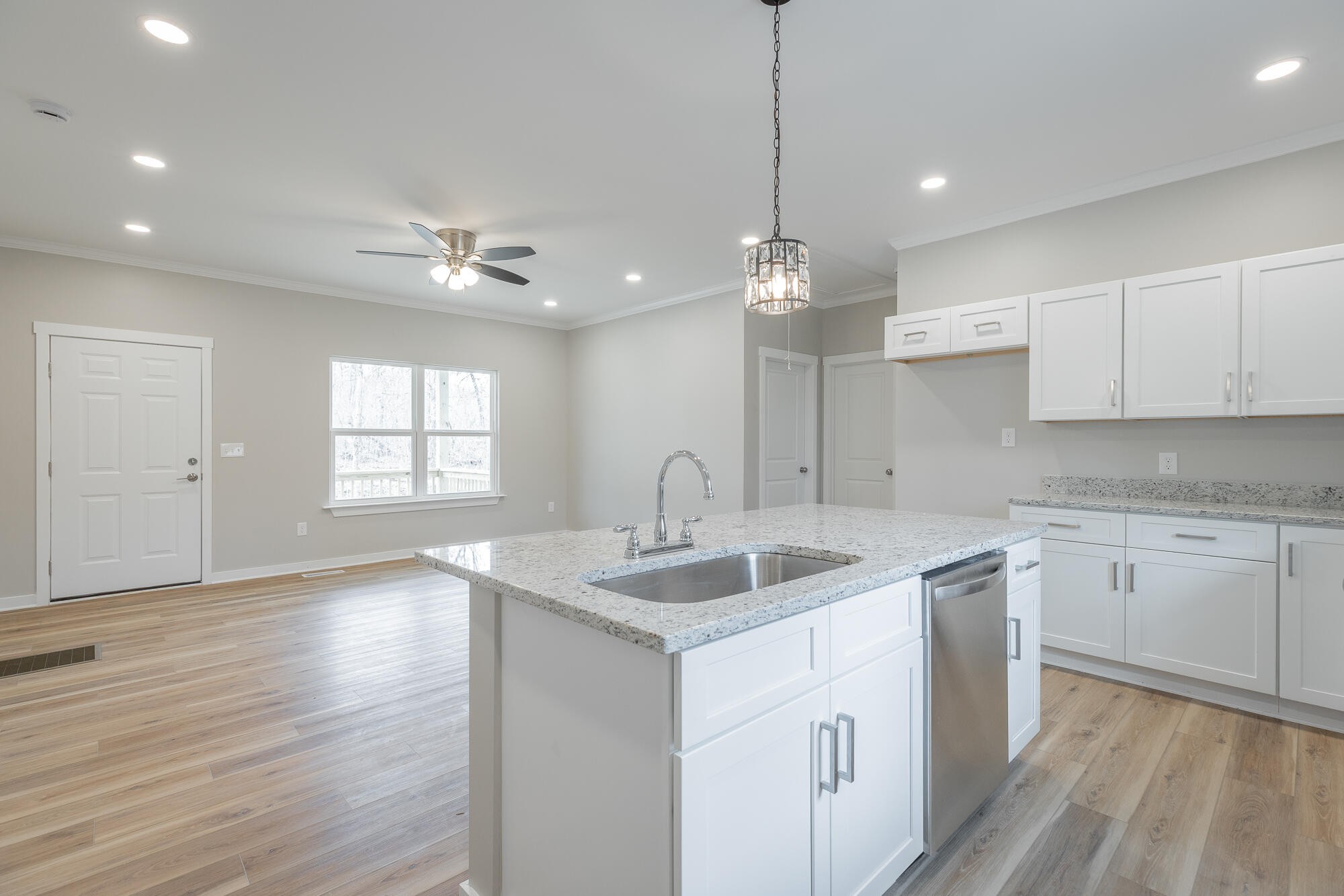 77 Pineway Circle Wildwood, GA 30757 - Photo 24 of 52 a view of a kitchen counter space a sink wooden floor and appliances