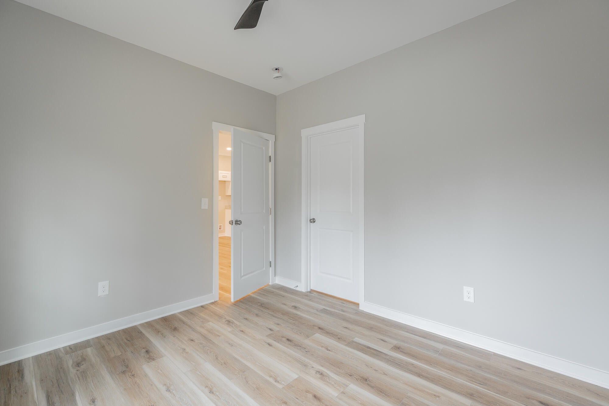 77 Pineway Circle Wildwood, GA 30757 - Photo 26 of 52 a view of an empty room with window and hardwood floor