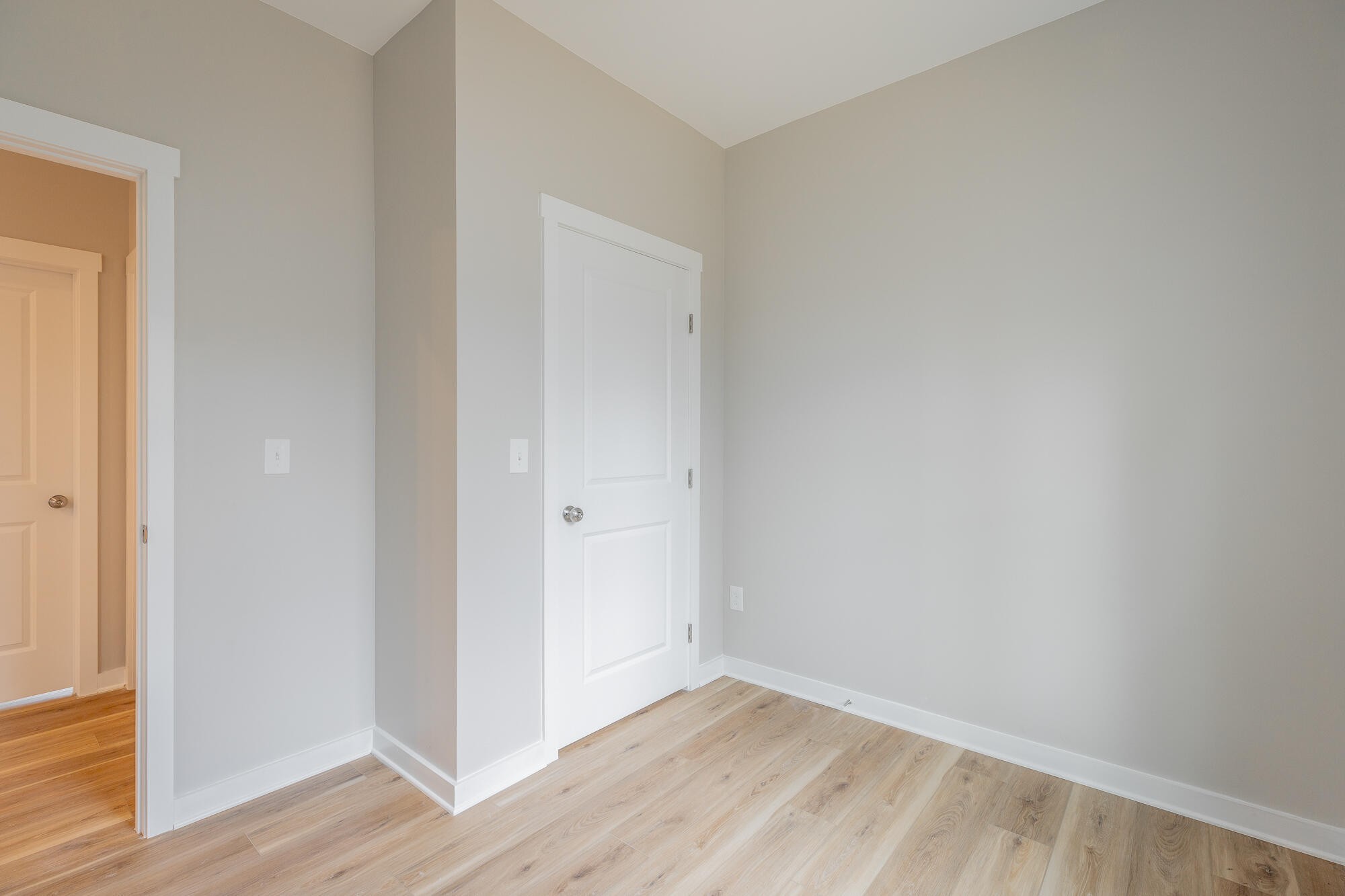 77 Pineway Circle Wildwood, GA 30757 - Photo 32 of 52 a view of an empty room with wooden floor