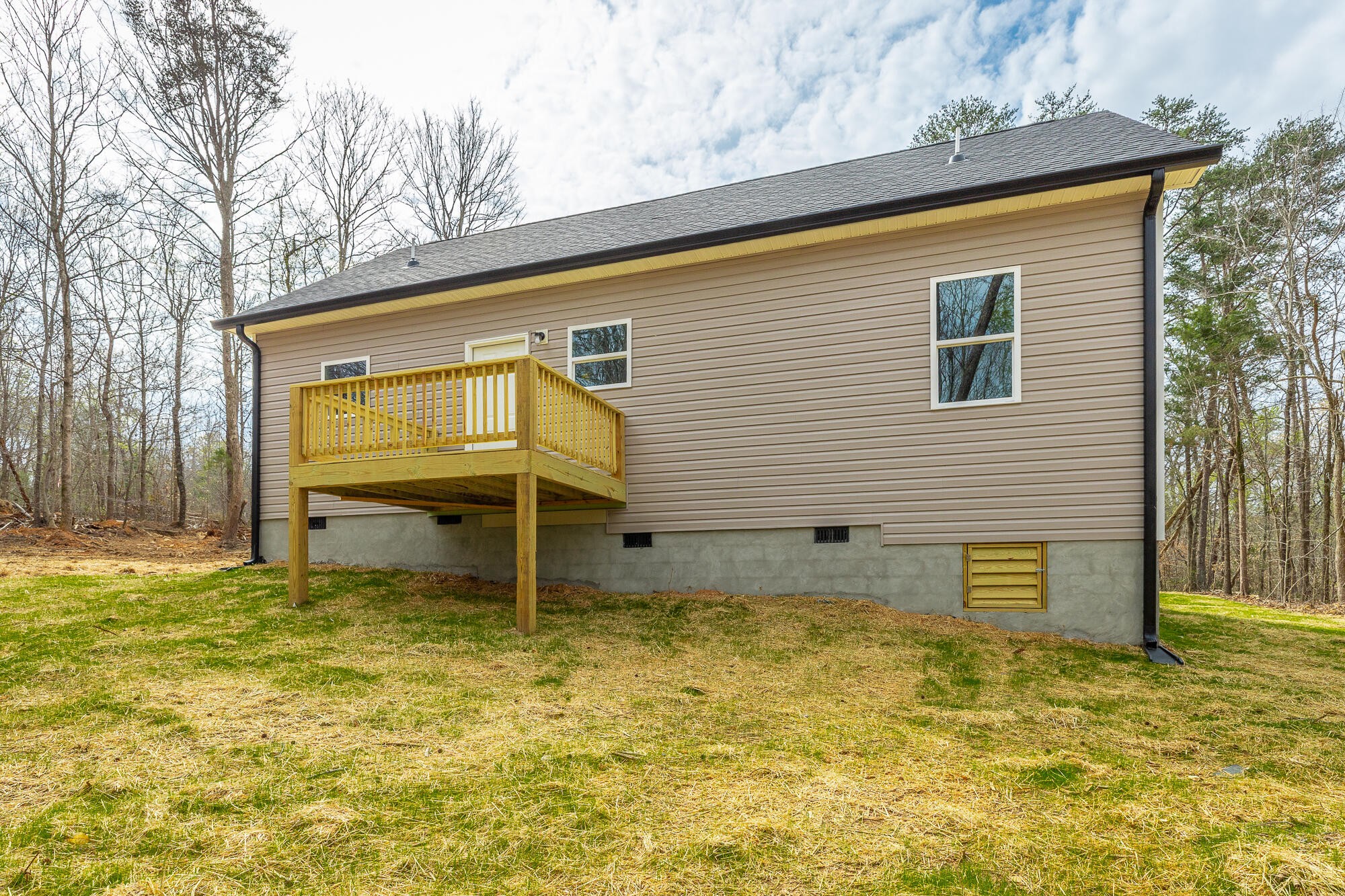 77 Pineway Circle Wildwood, GA 30757 - Photo 39 of 52 a view of a house with a backyard