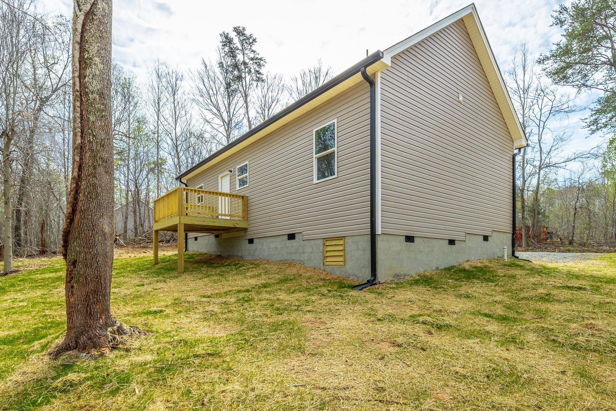 77 Pineway Circle Wildwood, GA 30757 - Photo 40 of 52 a backyard of a house with table and chairs