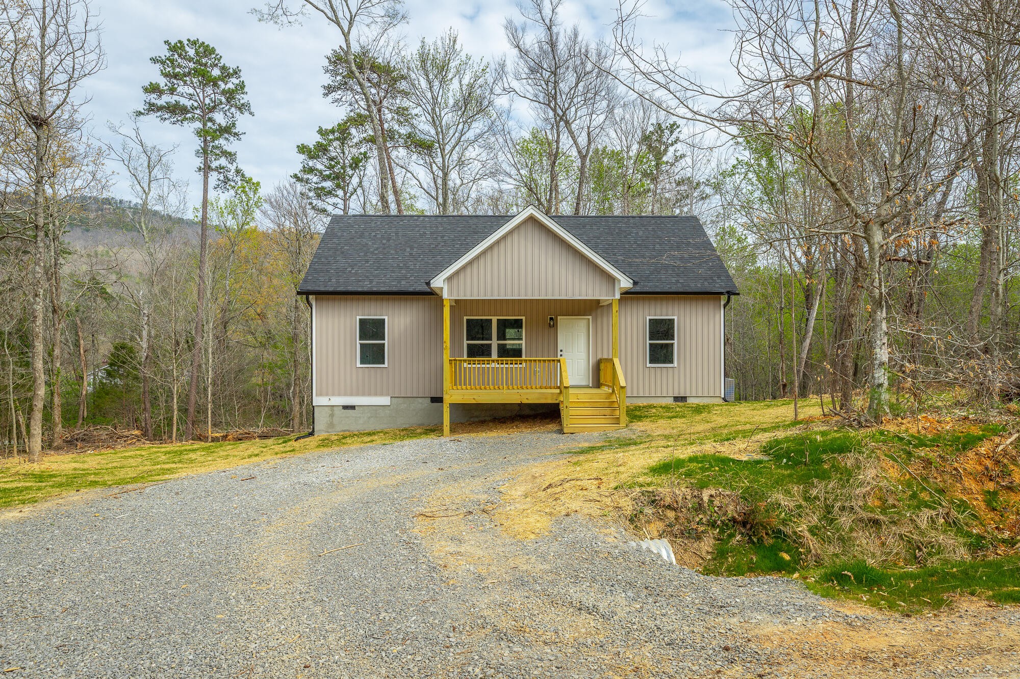 77 Pineway Circle Wildwood, GA 30757 - Photo 5 of 52 a house with trees in the background