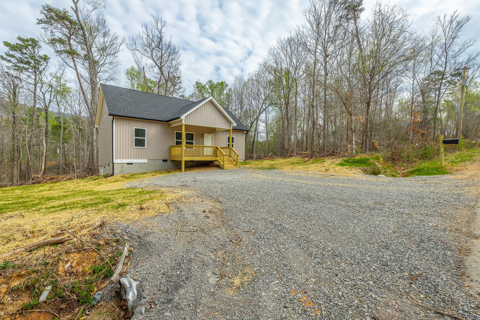 77 Pineway Circle Wildwood, GA 30757 - Photo 51 of 52 a view of a house with a yard and large trees