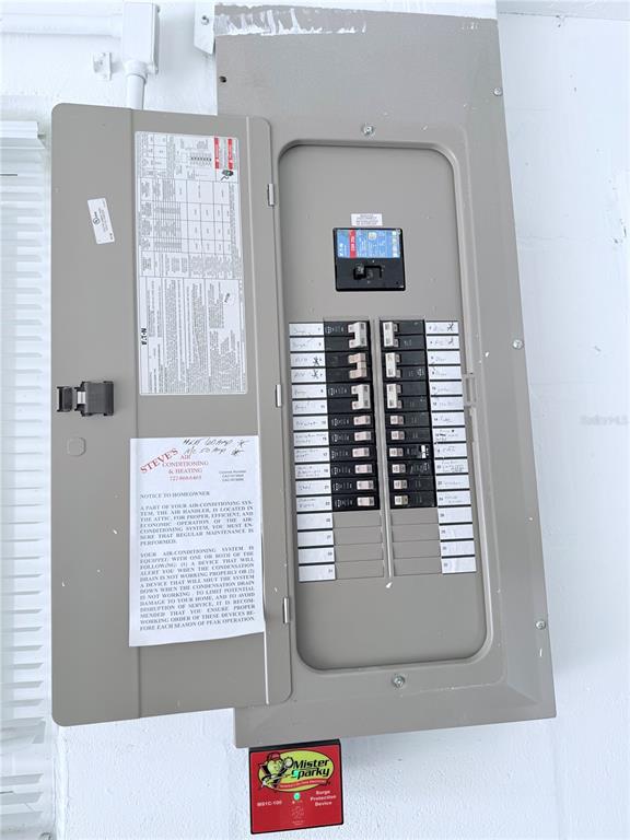 9733 Dick Street Hudson, FL 34669 - Photo 12 of 40 a view of a hallway with windows