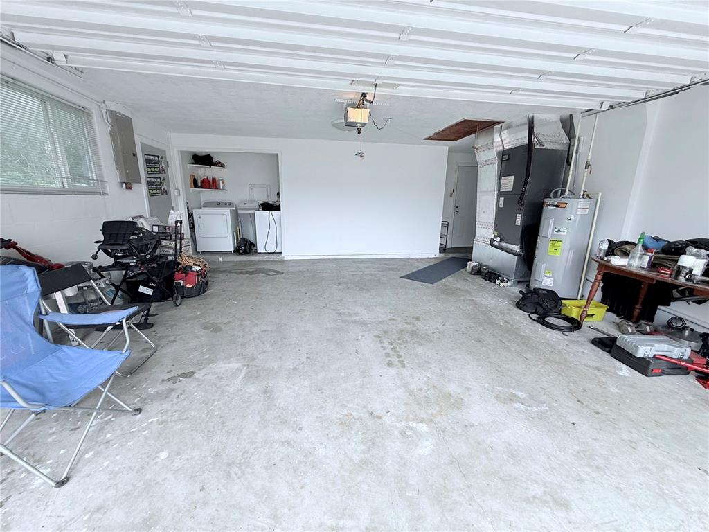 9733 Dick Street Hudson, FL 34669 - Photo 2 of 40 a room with gym equipment