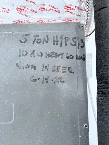 a view of a hallway with windows