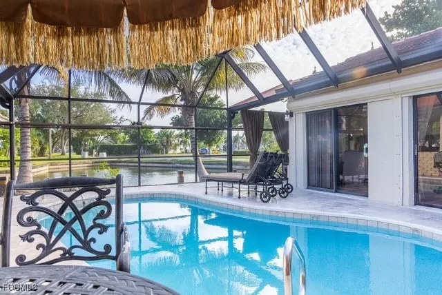 a view of a dining room with furniture wooden floor and a potted plant