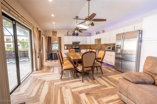 a view of a dining room with furniture