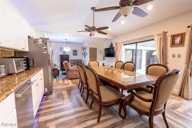 a view of a lake with a house in the background