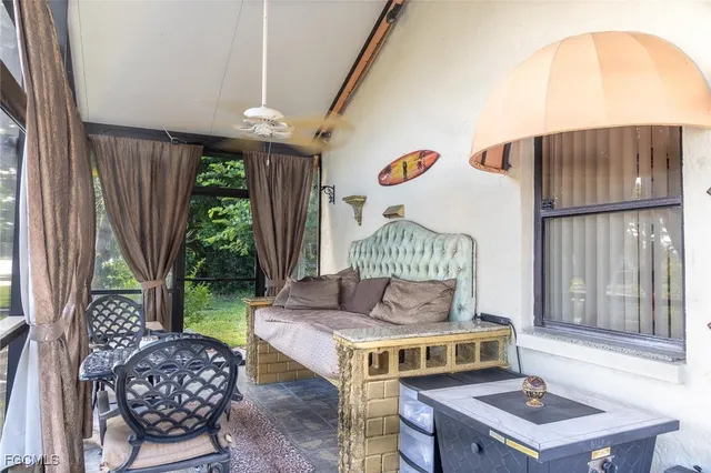 a living room with a couch and a table