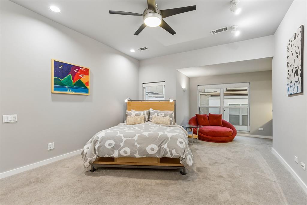 4139 Travis Street Dallas, TX 75204 - Photo 12 of 26 a bedroom with bed and window