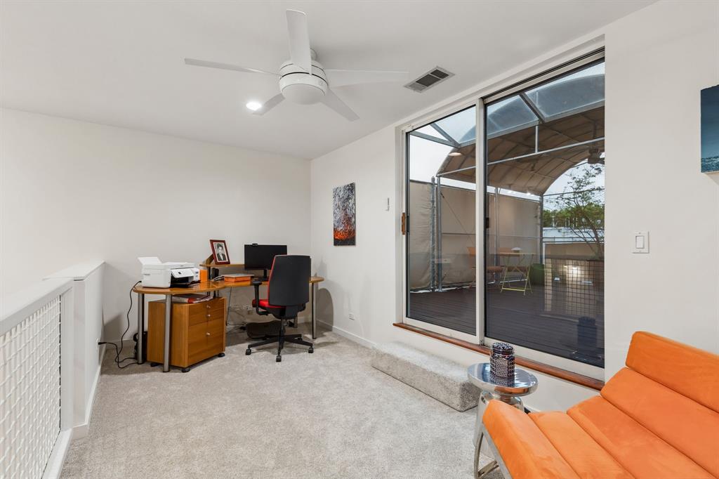 4139 Travis Street Dallas, TX 75204 - Photo 19 of 26 a view of a workspace with furniture and natural light
