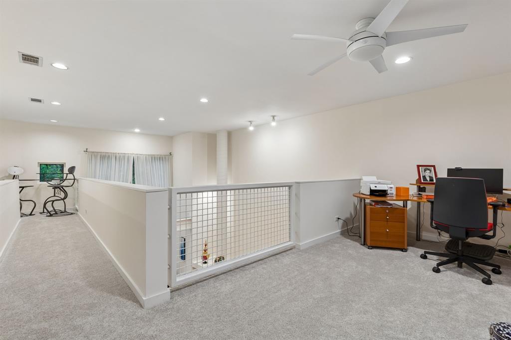 4139 Travis Street Dallas, TX 75204 - Photo 20 of 26 a view of a workspace with furniture