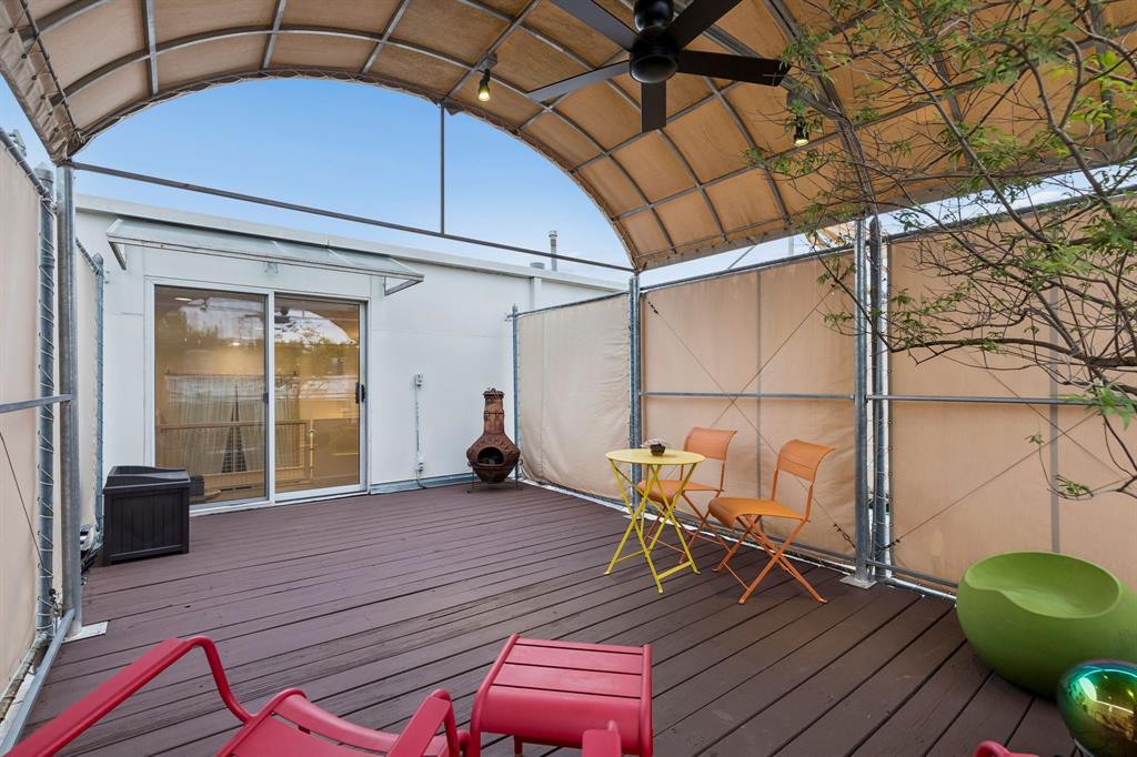 4139 Travis Street Dallas, TX 75204 - Photo 23 of 26 a view of a chairs in a balcony