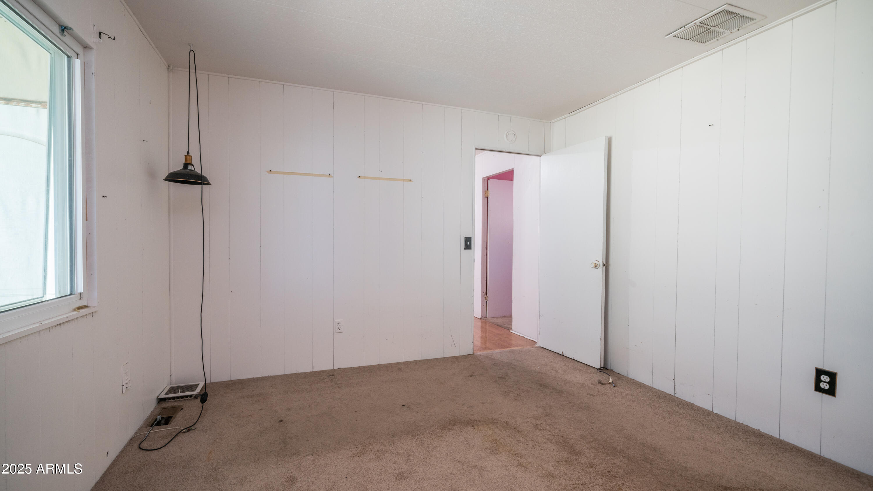 2359 South Tomahawk Road Apache Junction, AZ 85119 - Photo 18 of 32 a view of an empty room