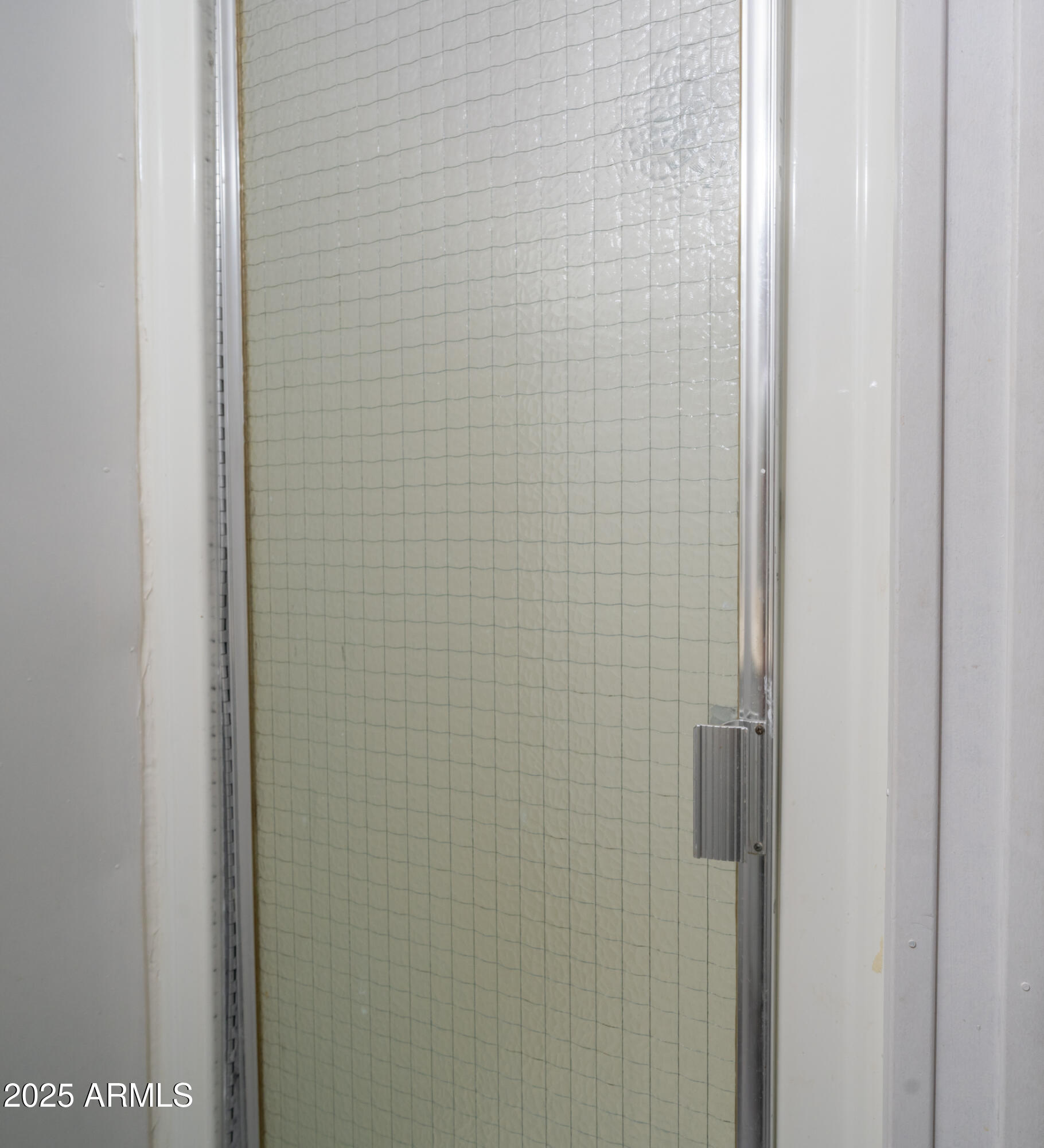 2359 South Tomahawk Road Apache Junction, AZ 85119 - Photo 23 of 32 a bathroom with a shower