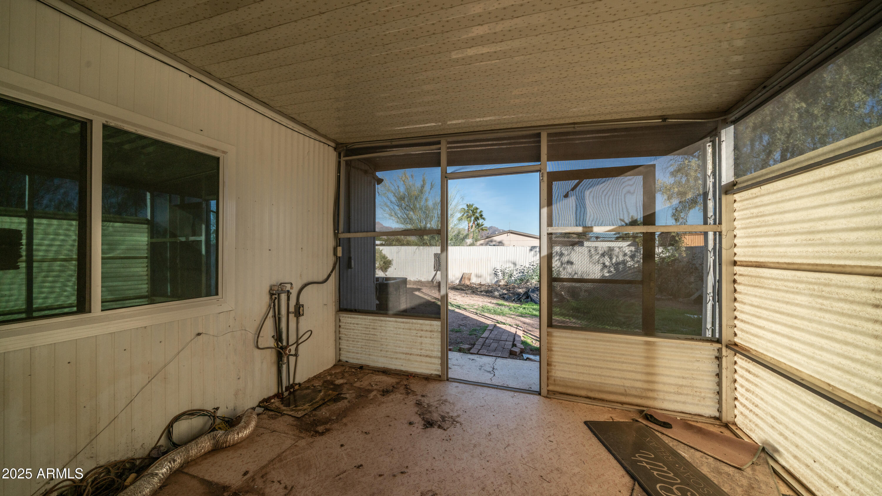 2359 South Tomahawk Road Apache Junction, AZ 85119 - Photo 24 of 32 a view of a porch with a door