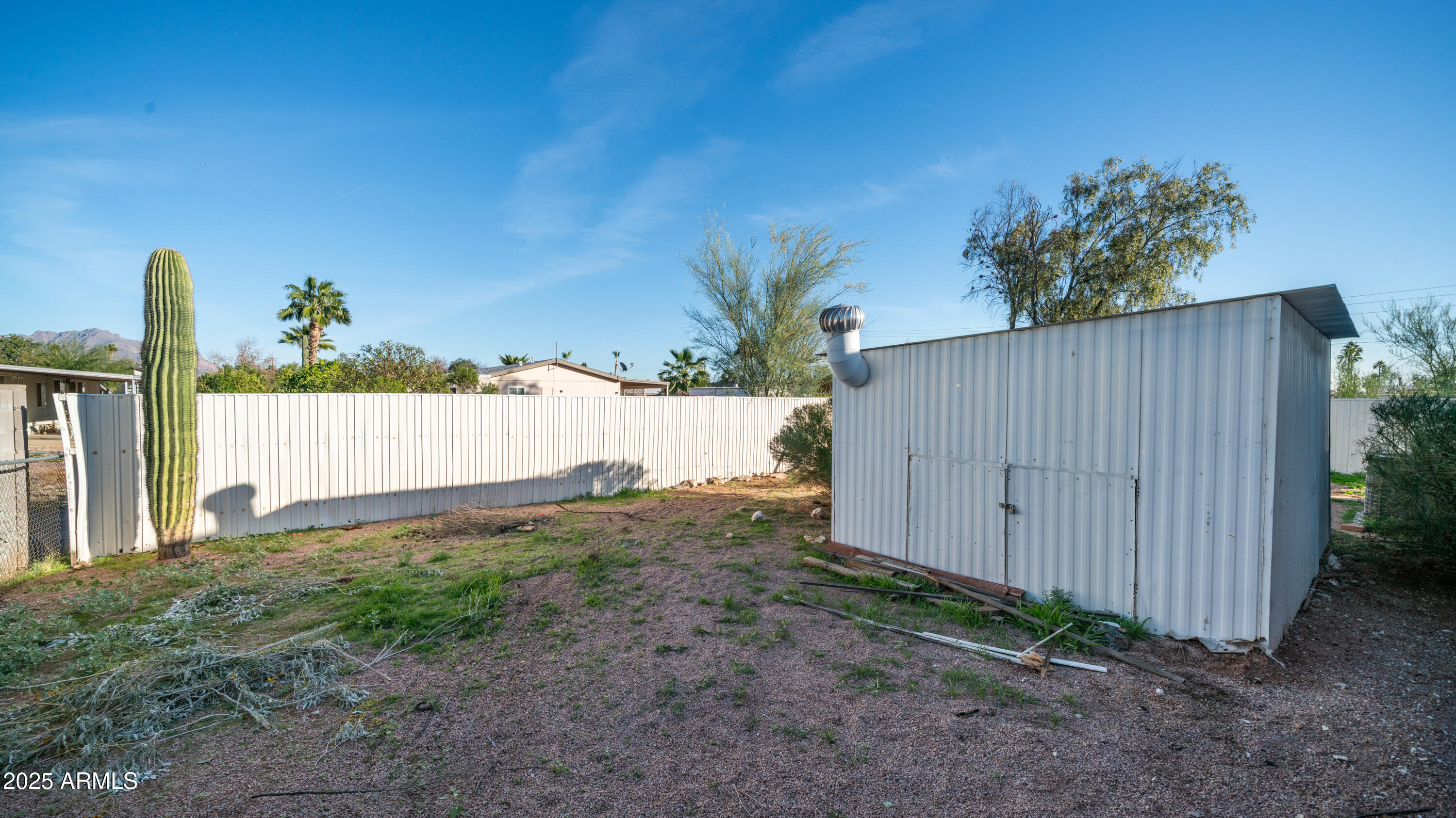 2359 South Tomahawk Road Apache Junction, AZ 85119 - Photo 27 of 32 a backyard of a house