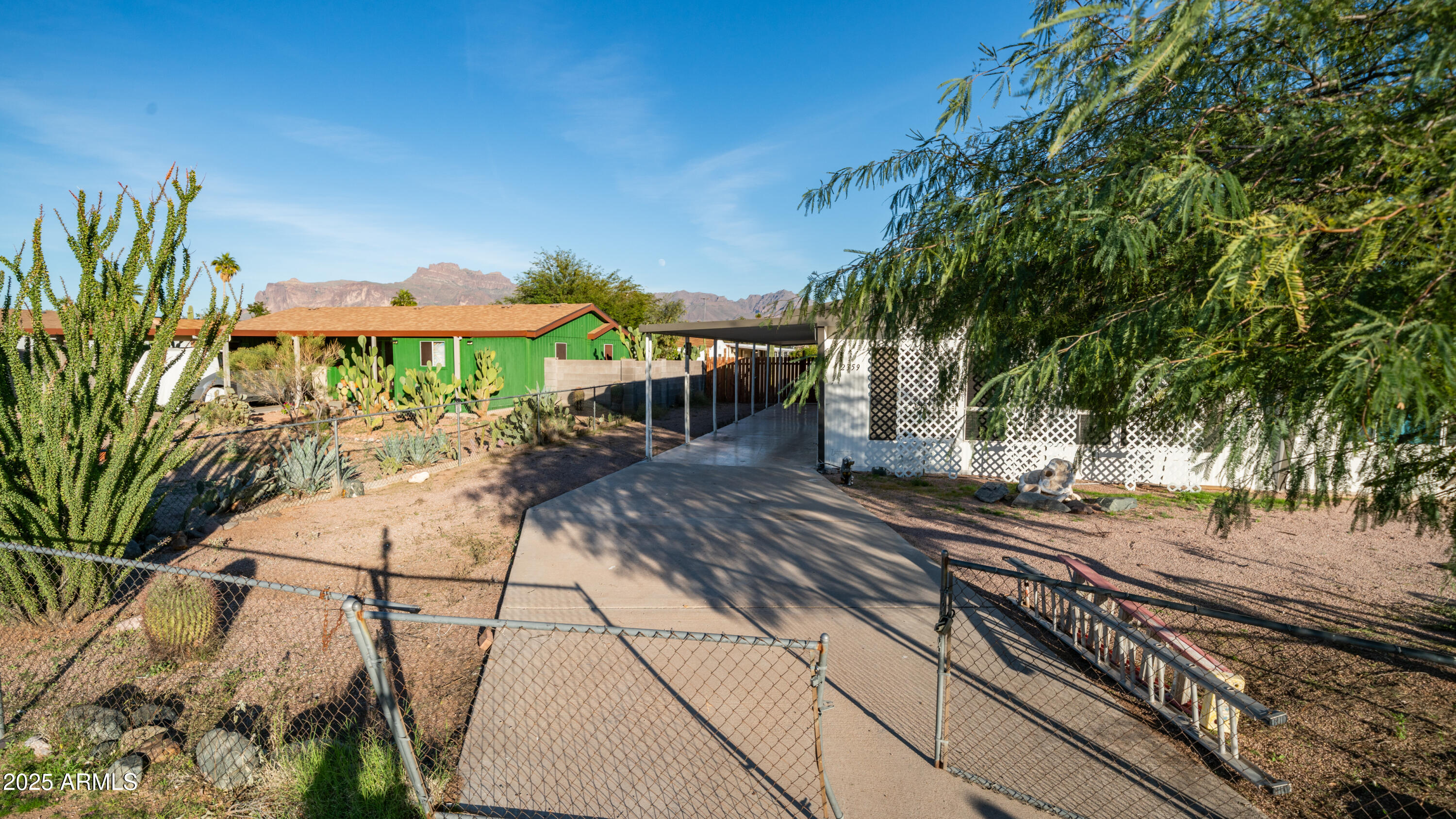 2359 South Tomahawk Road Apache Junction, AZ 85119 - Photo 3 of 32 a view of a backyard with sitting area